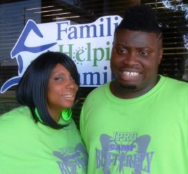 African American woman and man both wearing neon green camp shirts
