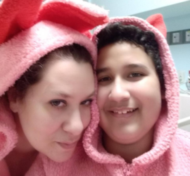 Mother and Son wearing pink rabbit hoodies