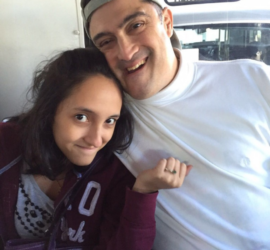 Hispanic father and his teenage daughter