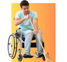 Caucasian male sitting in a wheelchair sweeping with a broom